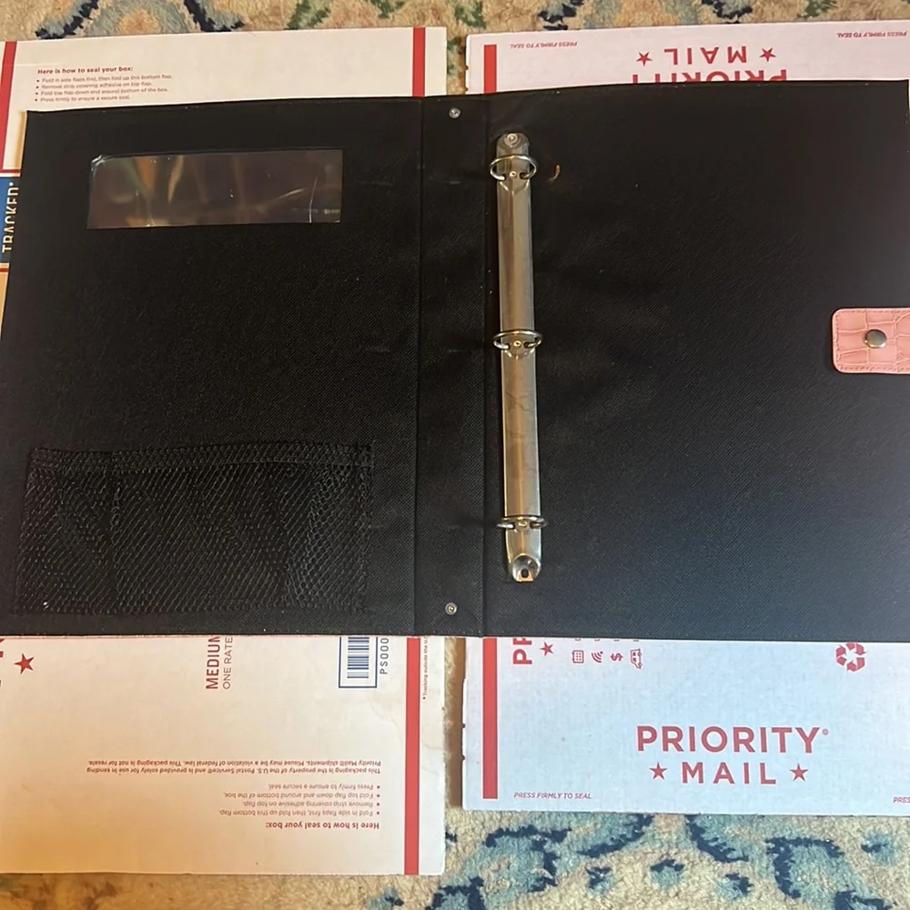 Pink crocodile pattern folder with clips